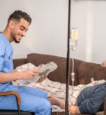 Nurse assisting elderly man at home in Chennai – post-hospital recovery, Gentle Hands Home Care caregiver supporting in-home rehabilitation, home recovery services Chennai